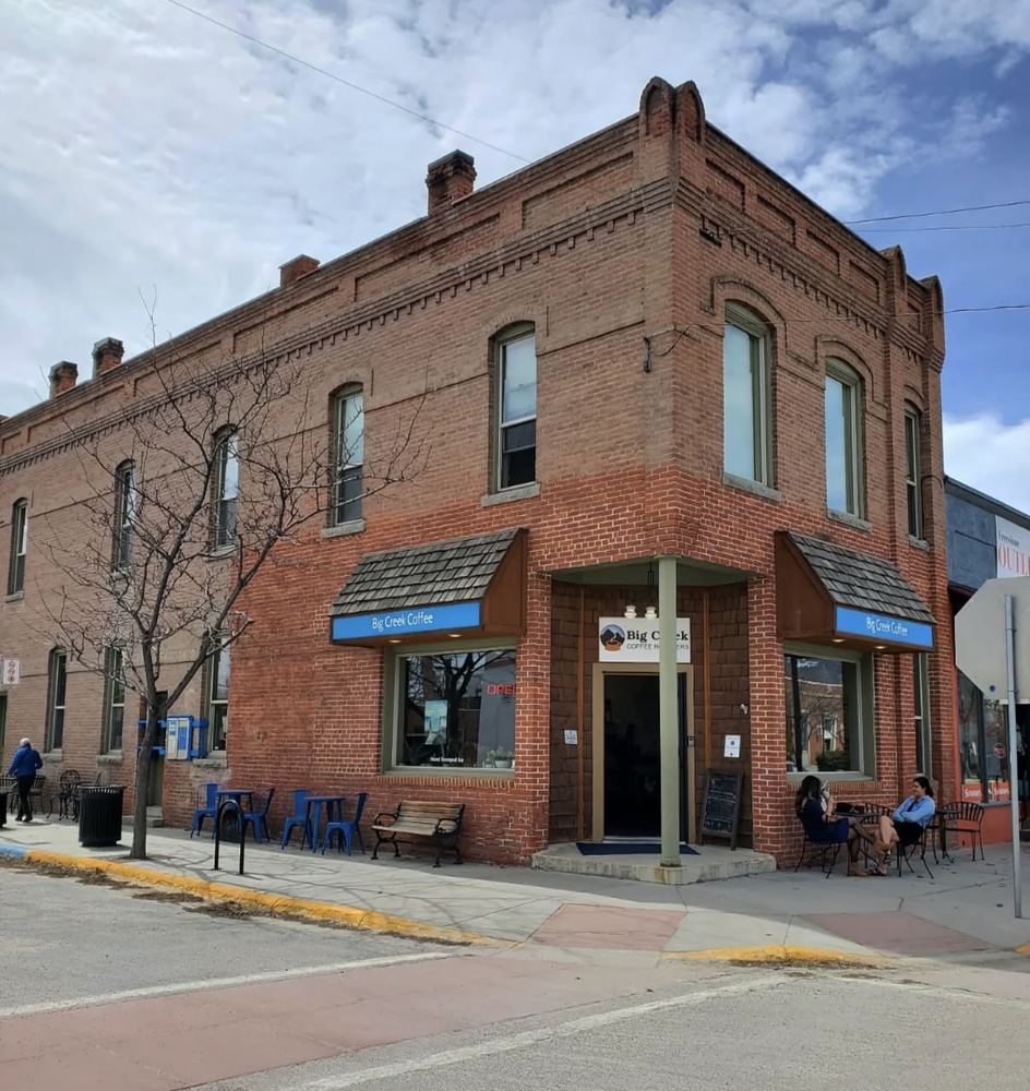 Big Creek Coffee storefront on a brick corner building